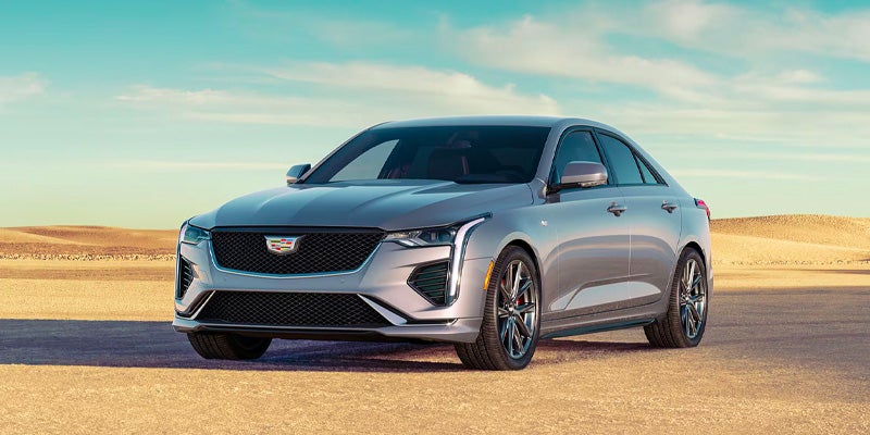 Front exterior view of the 2025 Cadillac CT4 parked in modern sunlight.