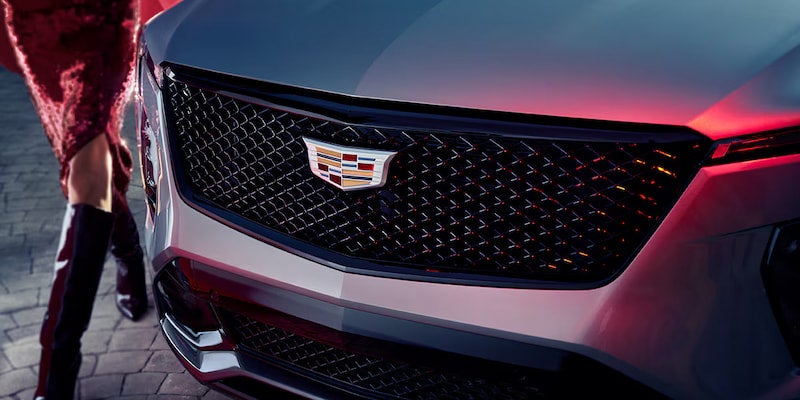 Front grille of the 2025 Cadillac XT4 illuminated at night