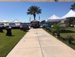 Lawn tents set up along sidewalk at the Taste Of Ormond